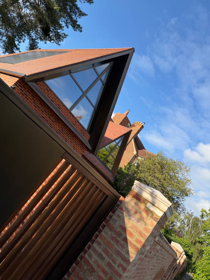 The glazed triangular gables viewed from below
